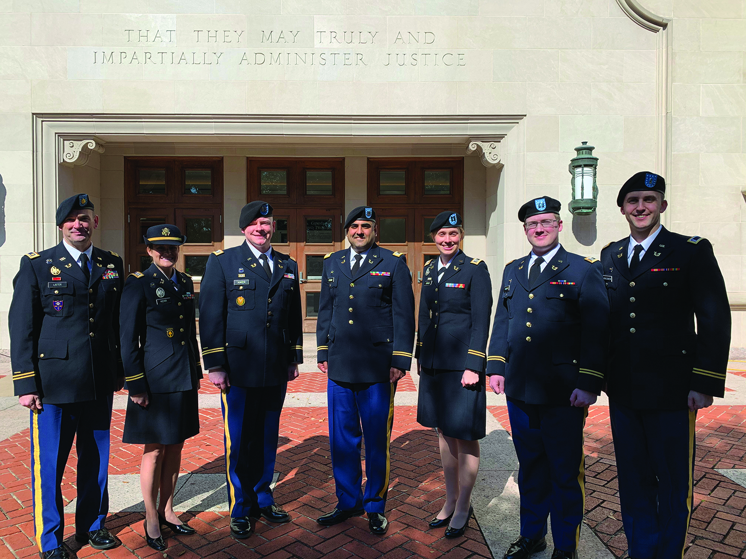 Members of the III Corps Military Justice Team attend an ACCA Outreach Oral Argument at the University of Texas School of Law in Austin, Texas (from left to right: LTC Shaun Lister, CPTs Callin Kerr, Cadman Kiker, Jason Otano, Emily Ervin, and Erik Thomas, and 1LT Connor Kohlscheen).